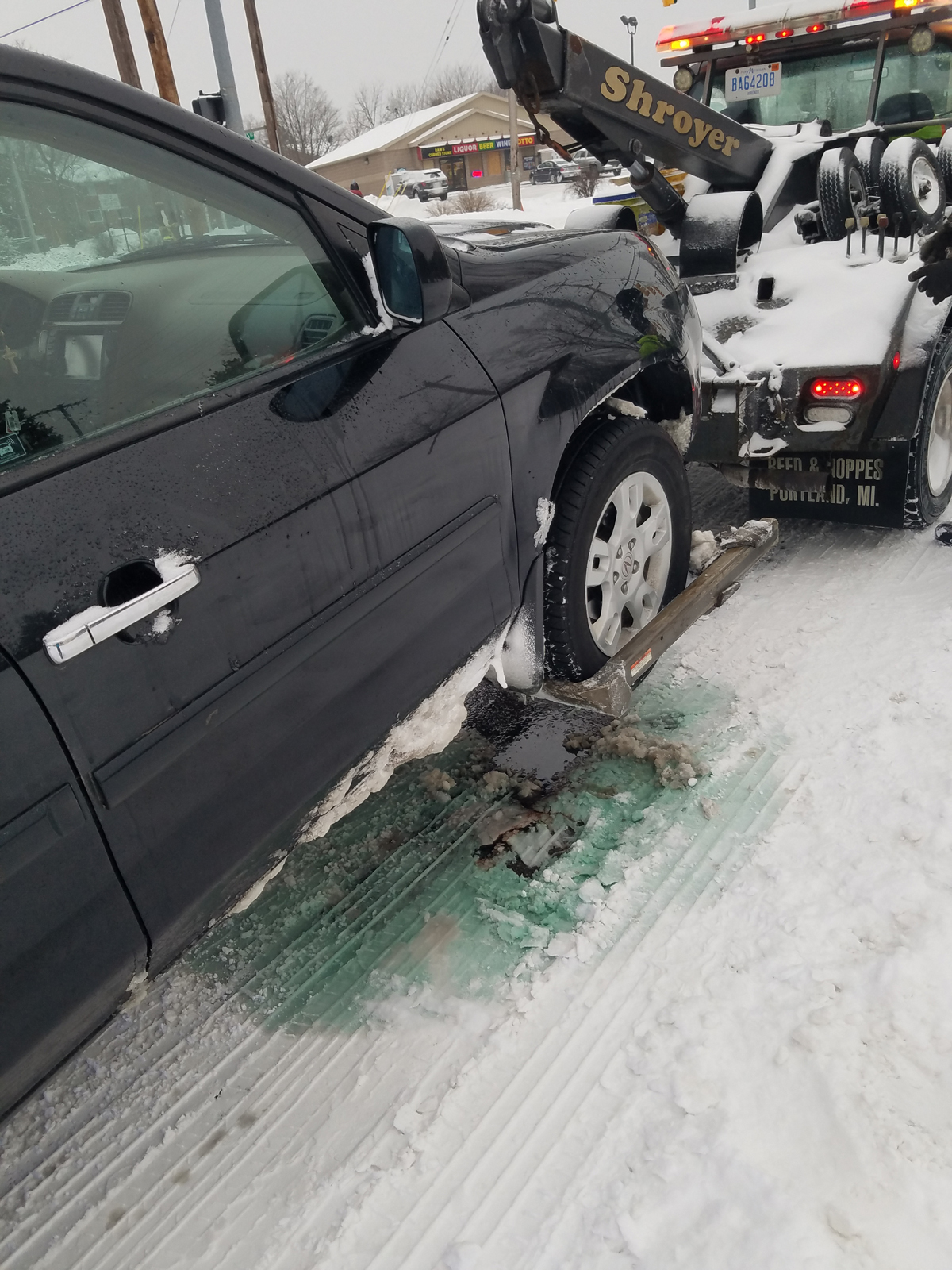 Acura on a tow truck