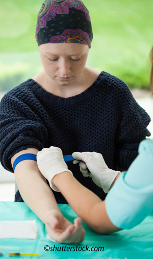 chemo patient getting her blood drawn