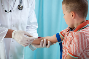 boy getting his blood drawn