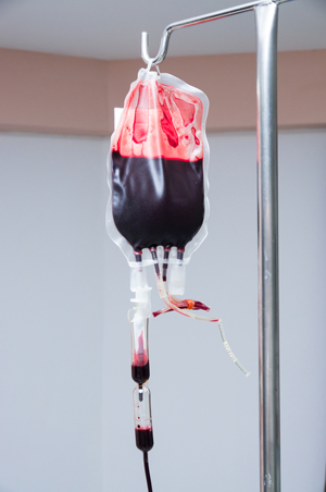 donor blood hanging from IV pole